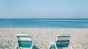 On the beach, white sand