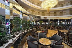 3 bars/lounges, poolside bar, beach bar