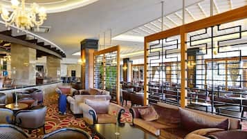 3 bars/lounges, poolside bar, beach bar