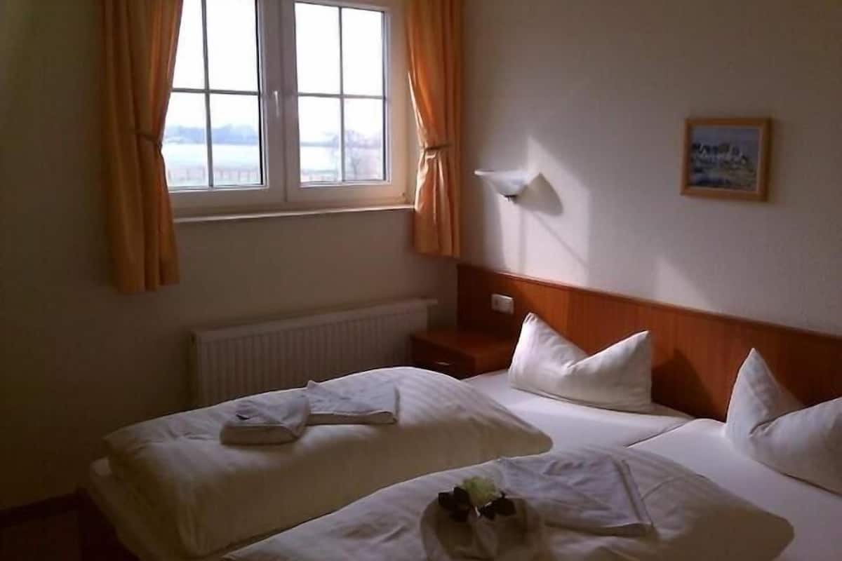 family apartment | in-room safe, rollaway beds, bed sheets