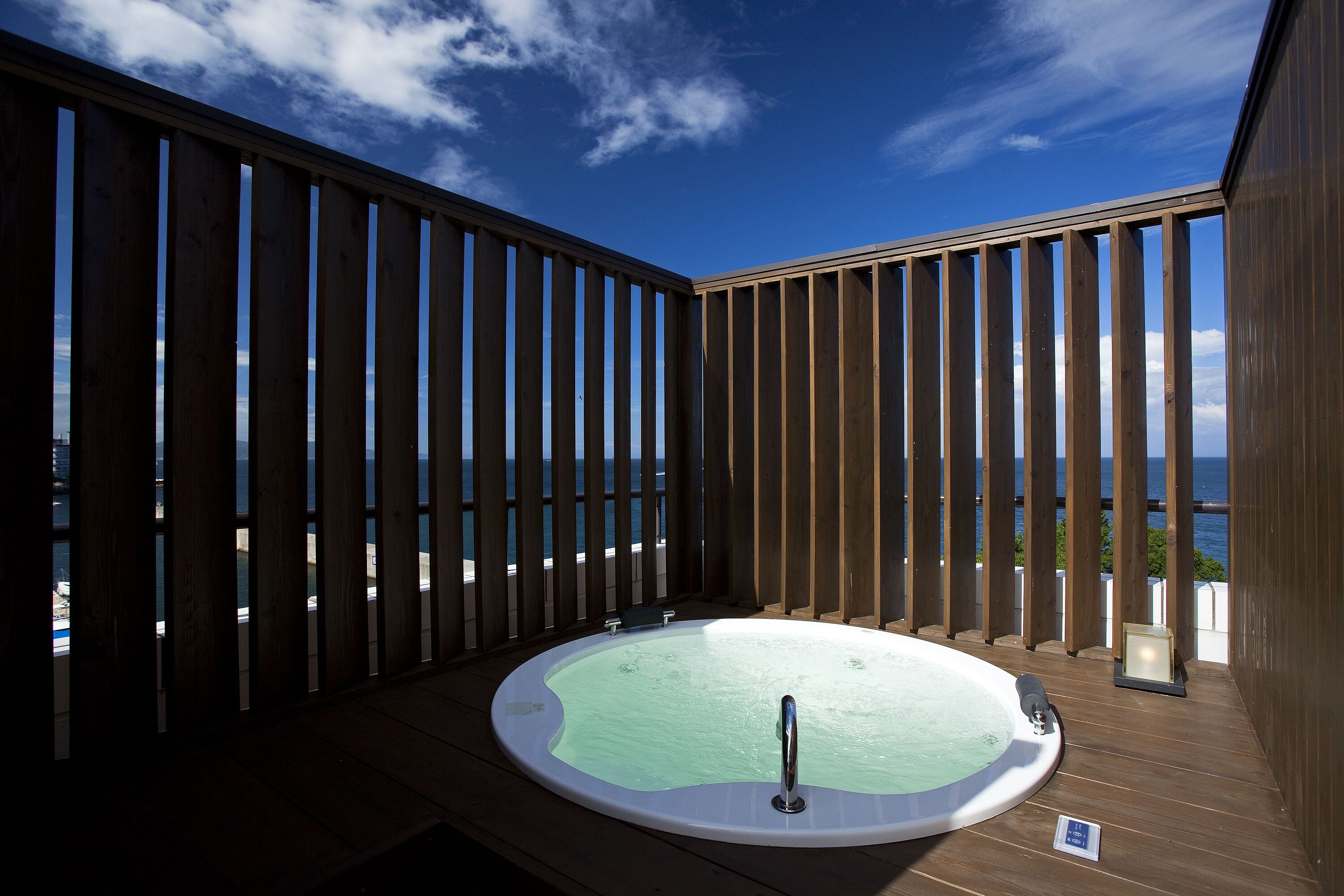 ocean twin room with private hot spring, smoking | in-room safe, free wifi, bed sheets, wheelchair access