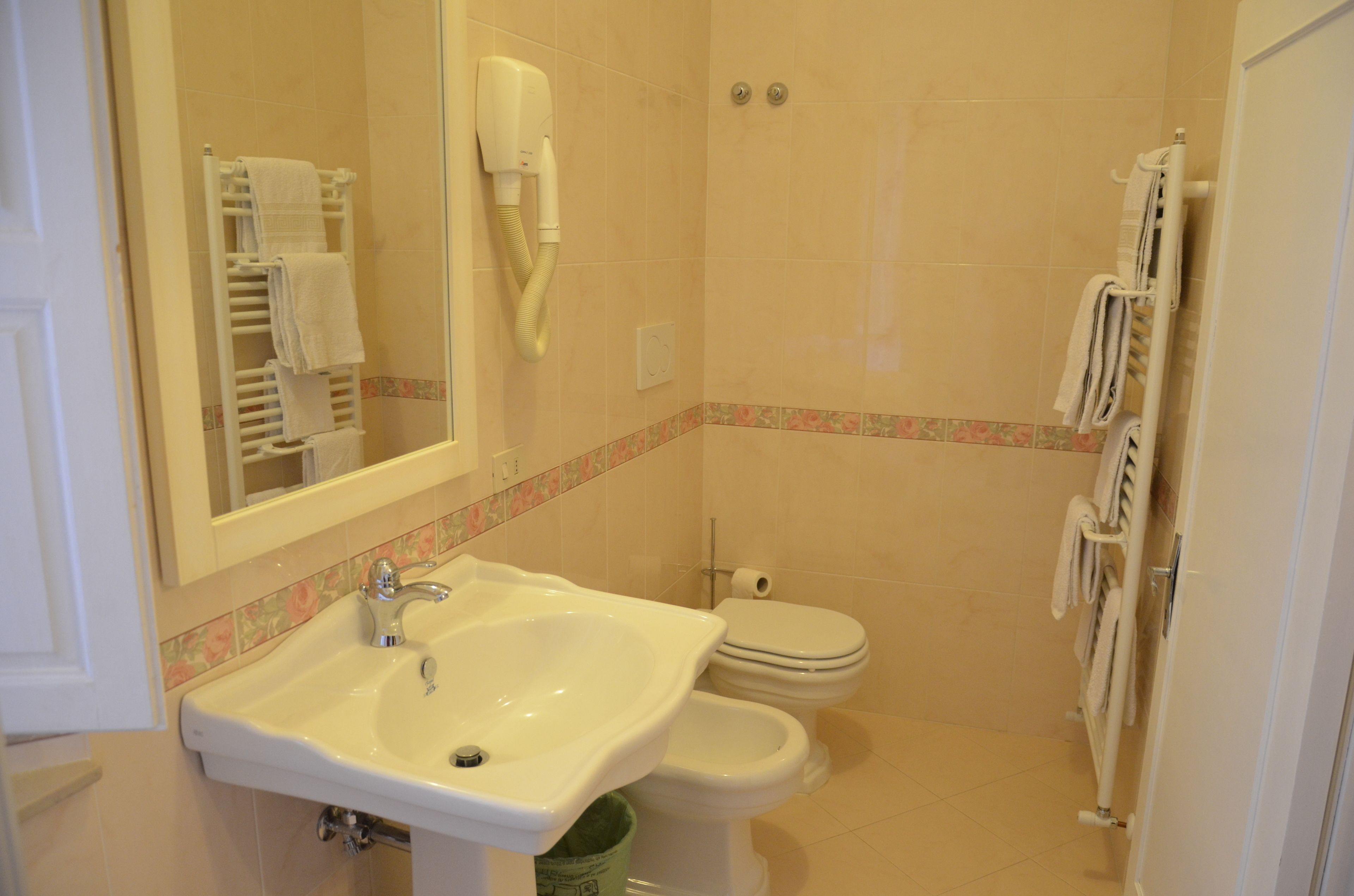 superior double room | bathroom | free toiletries, hair dryer, towels