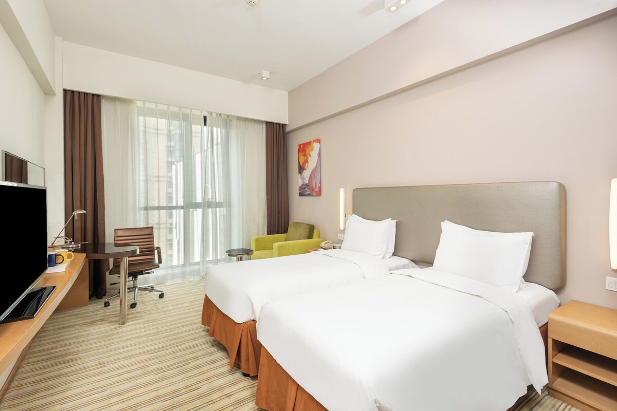 Premium bedding, down duvets, in-room safe, desk