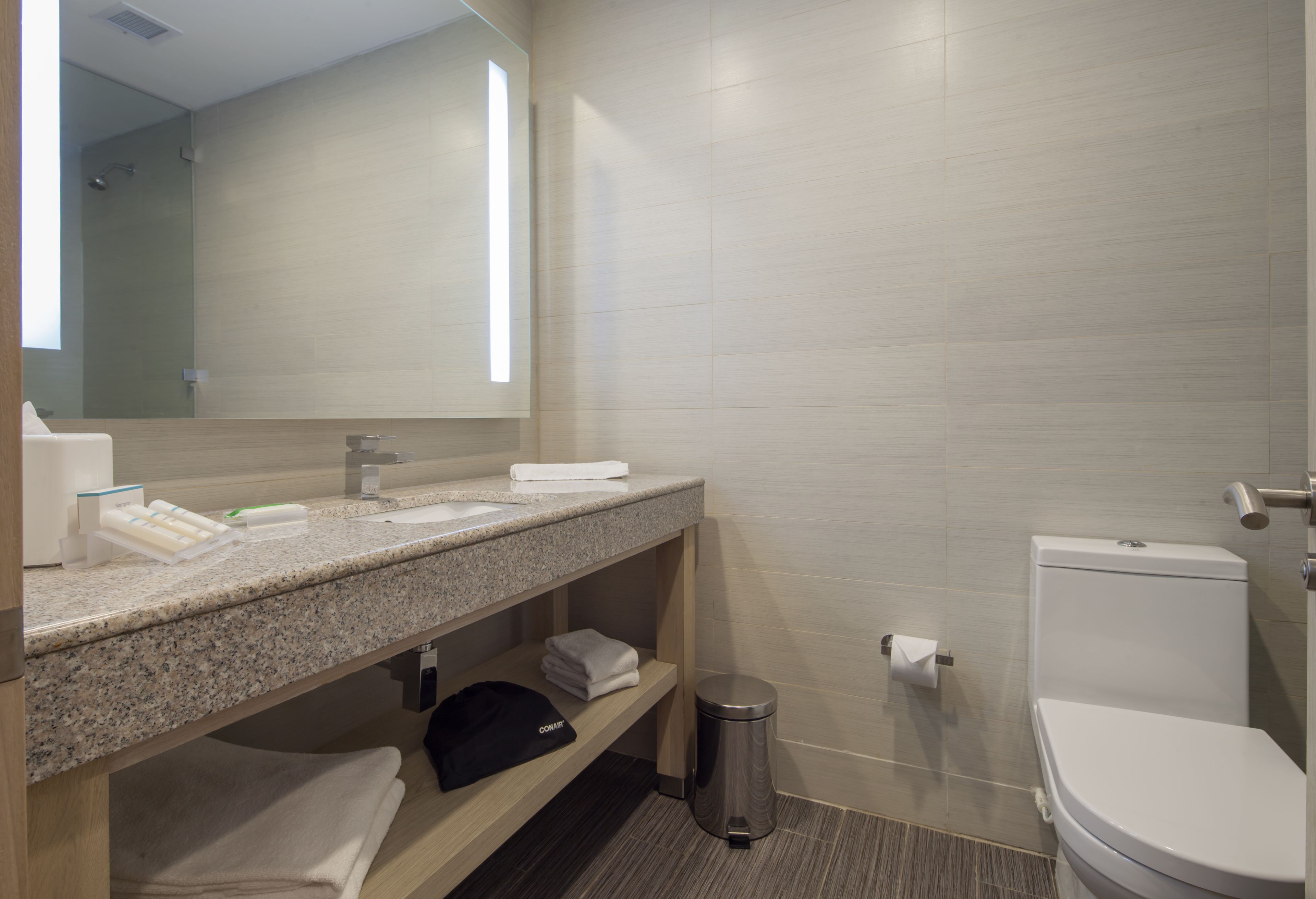 deluxe room, 1 king bed | bathroom | shower, free toiletries, towels