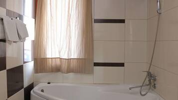 Hair dryer, towels, soap, toilet paper