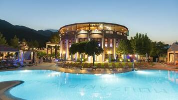 Indoor pool, seasonal outdoor pool, pool umbrellas, pool loungers