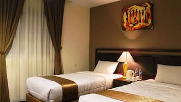 Deluxe Twin | Premium bedding, in-room safe, desk, free WiFi