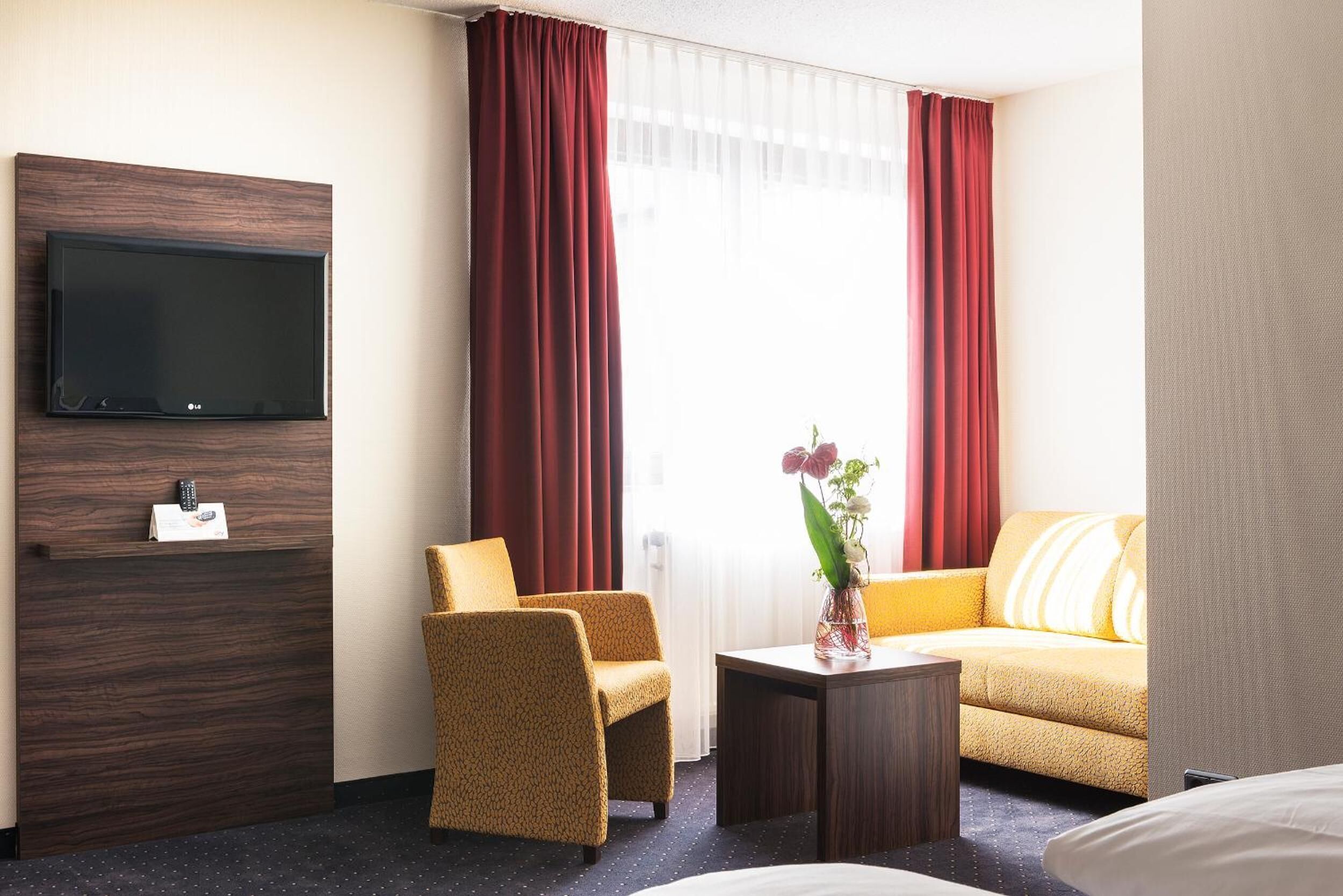 hypo-allergenic bedding, down duvets, minibar, desk