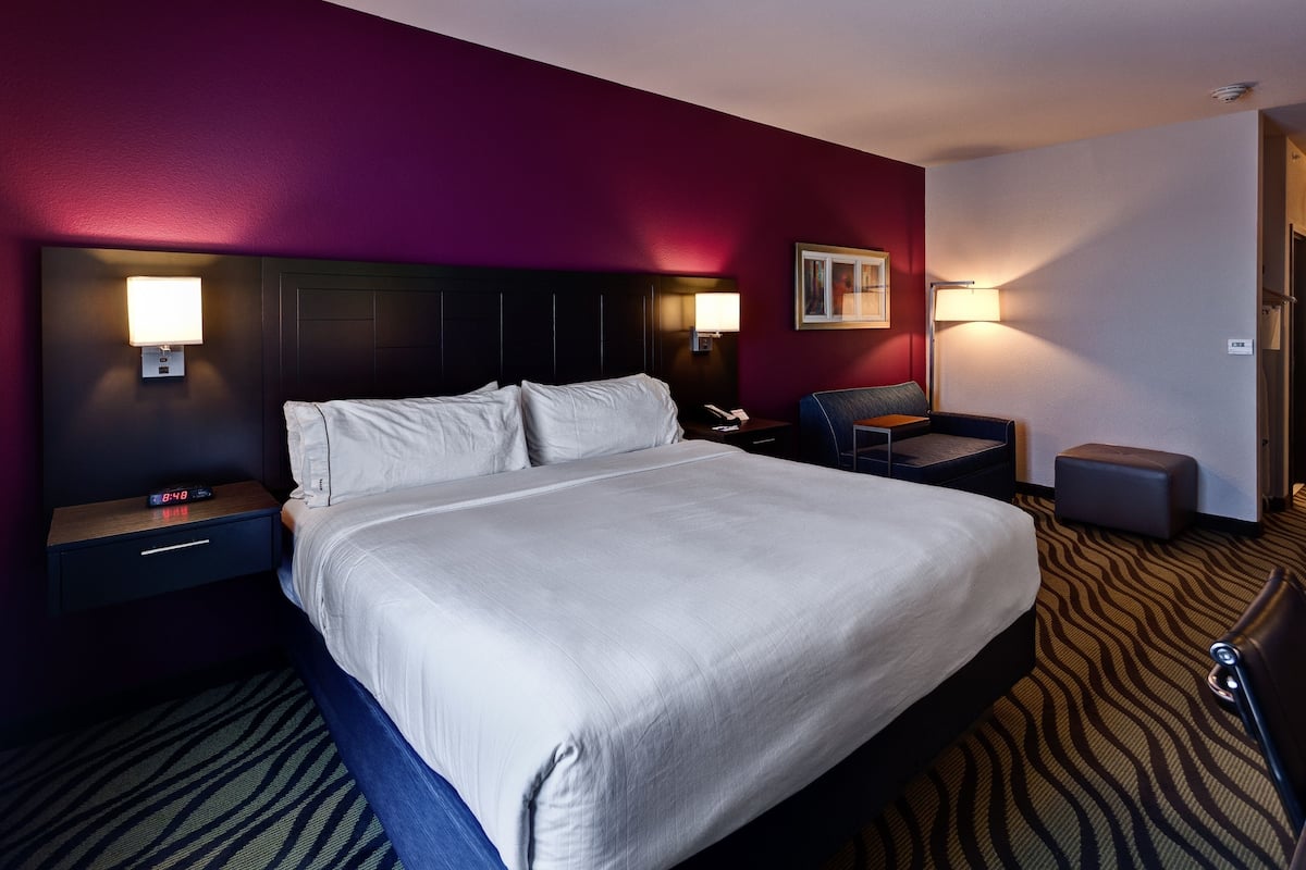 Premium bedding, pillow-top beds, desk, laptop workspace