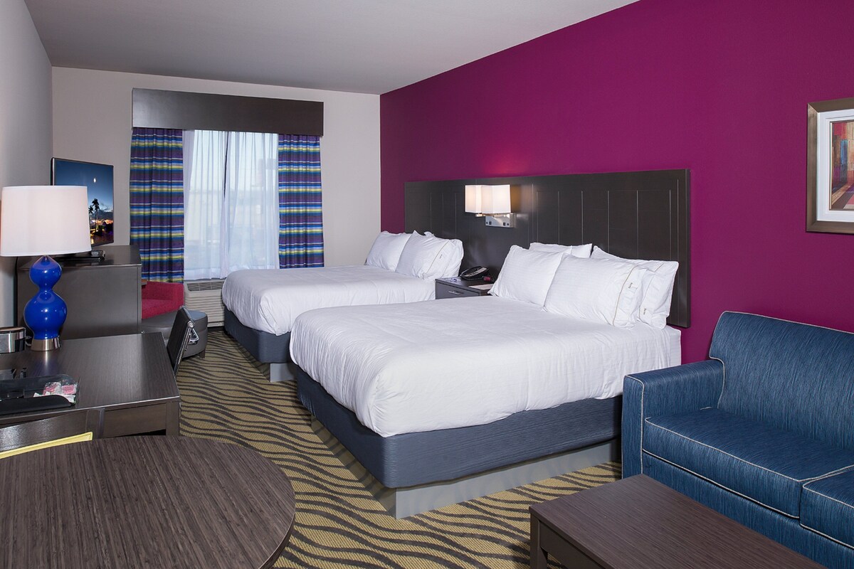 Premium bedding, pillowtop beds, desk, laptop workspace