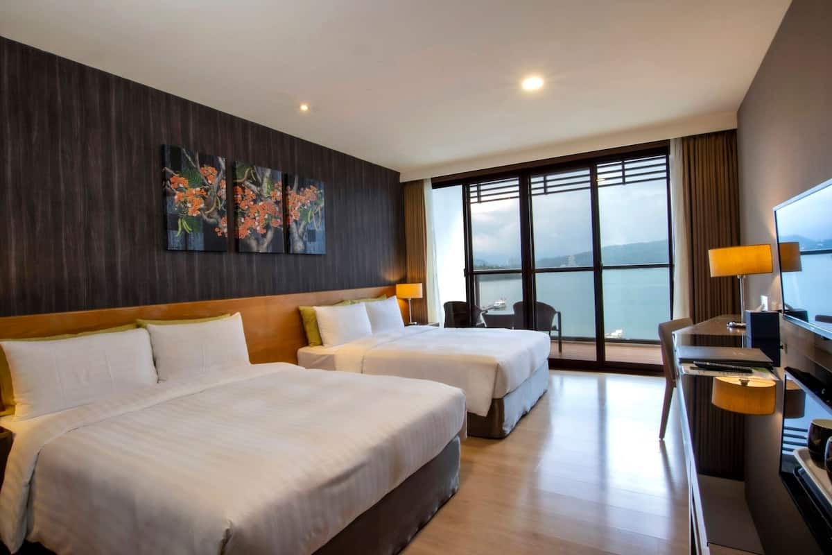 deluxe quadruple room, lake view | in-room safe, desk, blackout curtains, free wifi