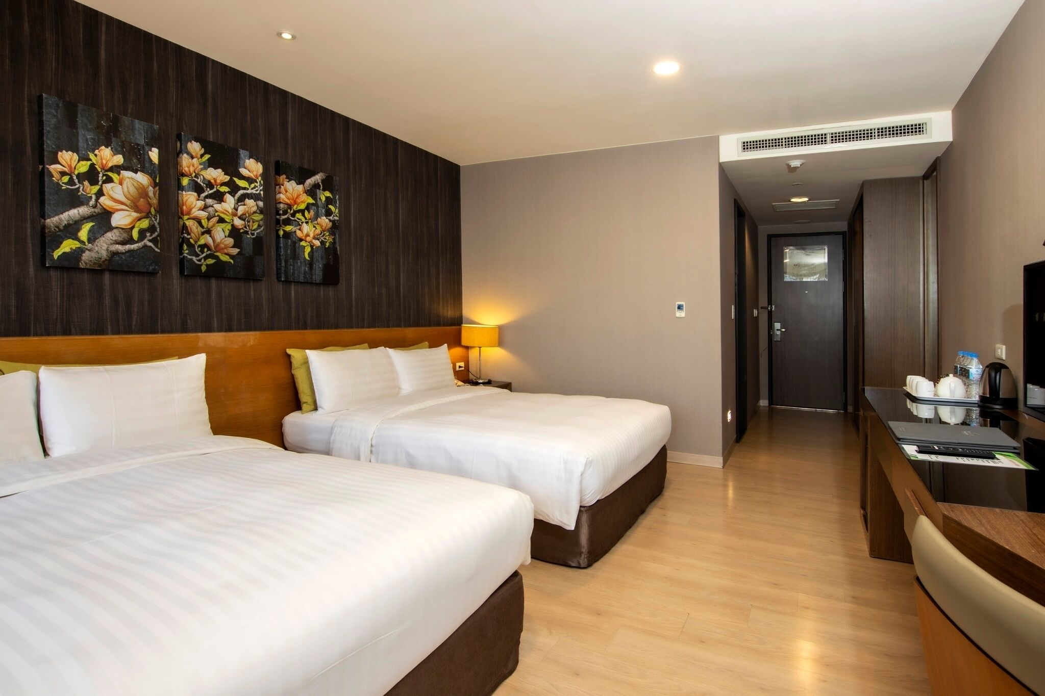 deluxe quadruple room, lake view | in-room safe, desk, blackout curtains, free wifi