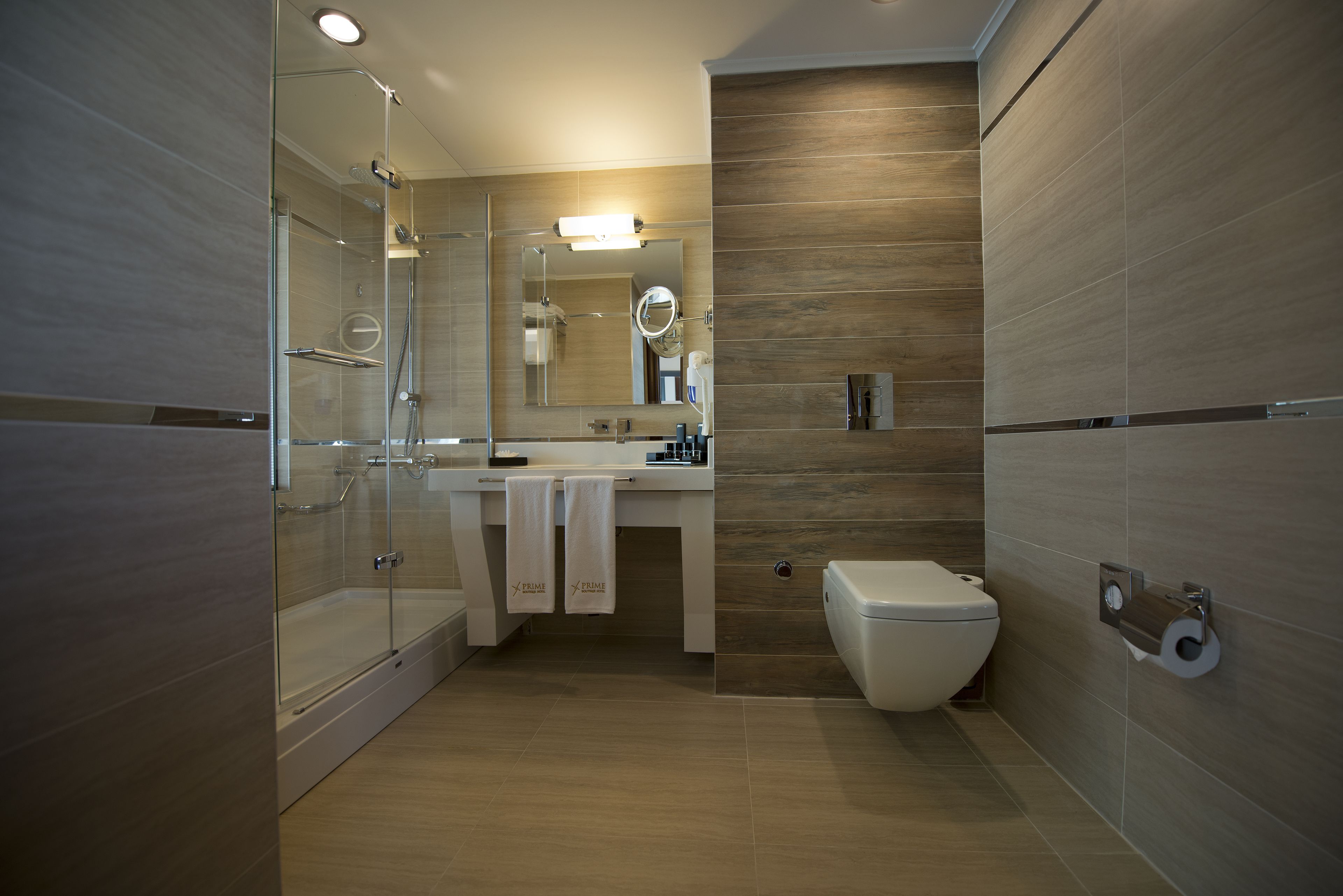 deep-soaking bathtub, rainfall showerhead, free toiletries, hair dryer