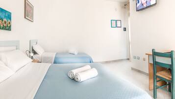 Standard Triple Room | Minibar, in-room safe, desk, free WiFi