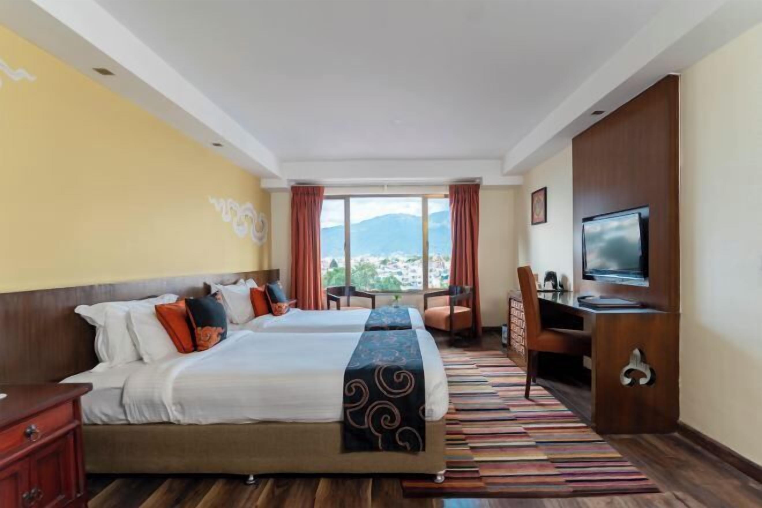 Premium bedding, in-room safe, individually decorated