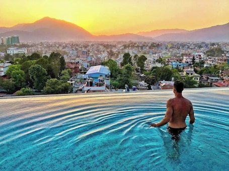 Outdoor pool, sun loungers. Hotel Shambala
