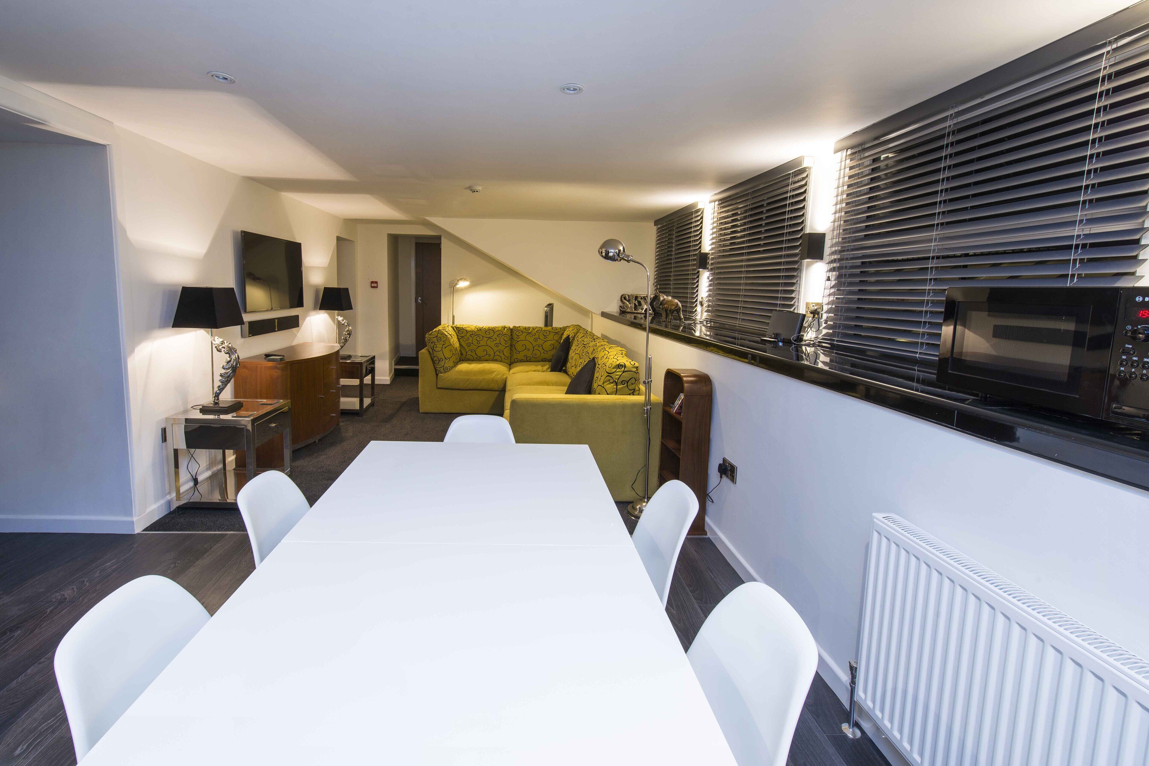 suite, 2 bedrooms | living area | tv