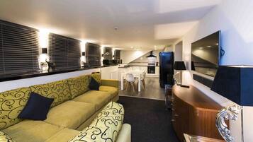 Suite, 2 Bedrooms | Living area | TV