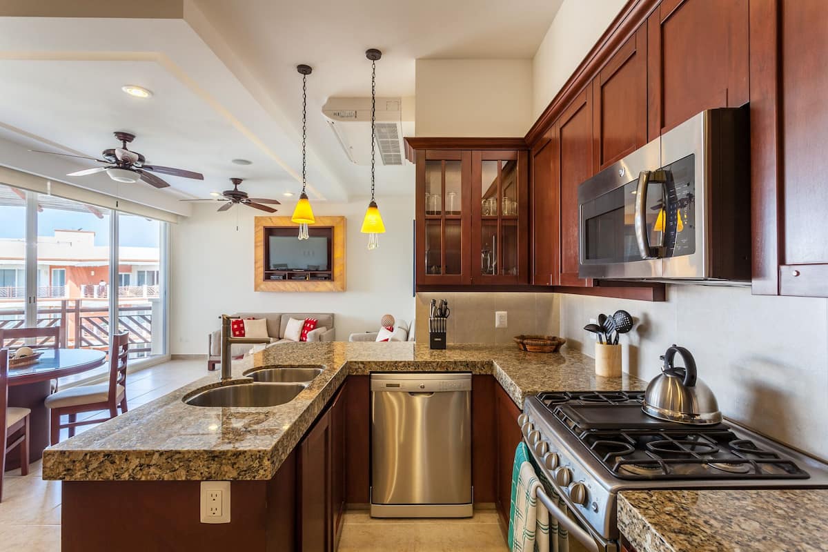 room, 2 bedrooms, partial ocean view | private kitchen | microwave, stovetop, coffee/tea maker, blender