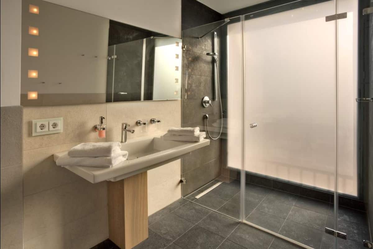 shower, free toiletries, hair dryer, bathrobes