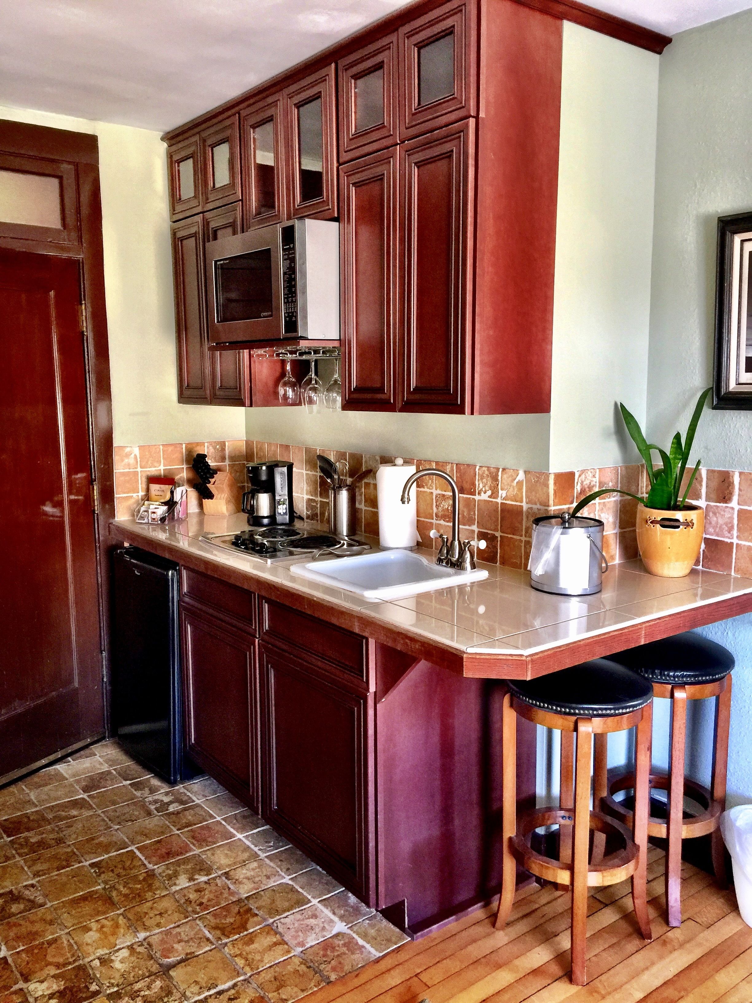 grand suite, 1 king bed | private kitchenette | fridge, microwave, coffee/tea maker, cookware/dishes/utensils