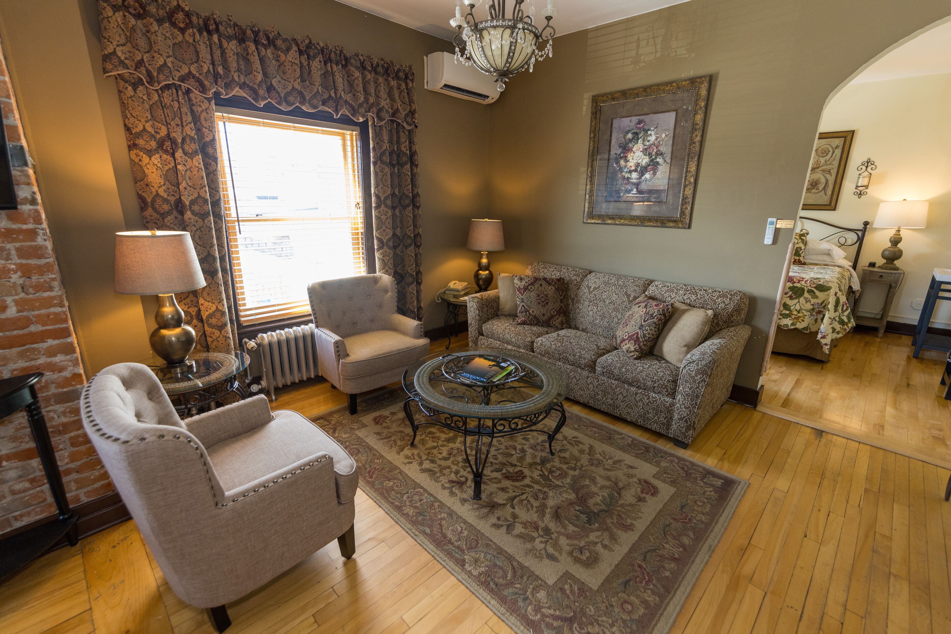 elite suite, 1 queen bed | living area | 42-inch plasma tv with premium tv channels, tv, dvd player