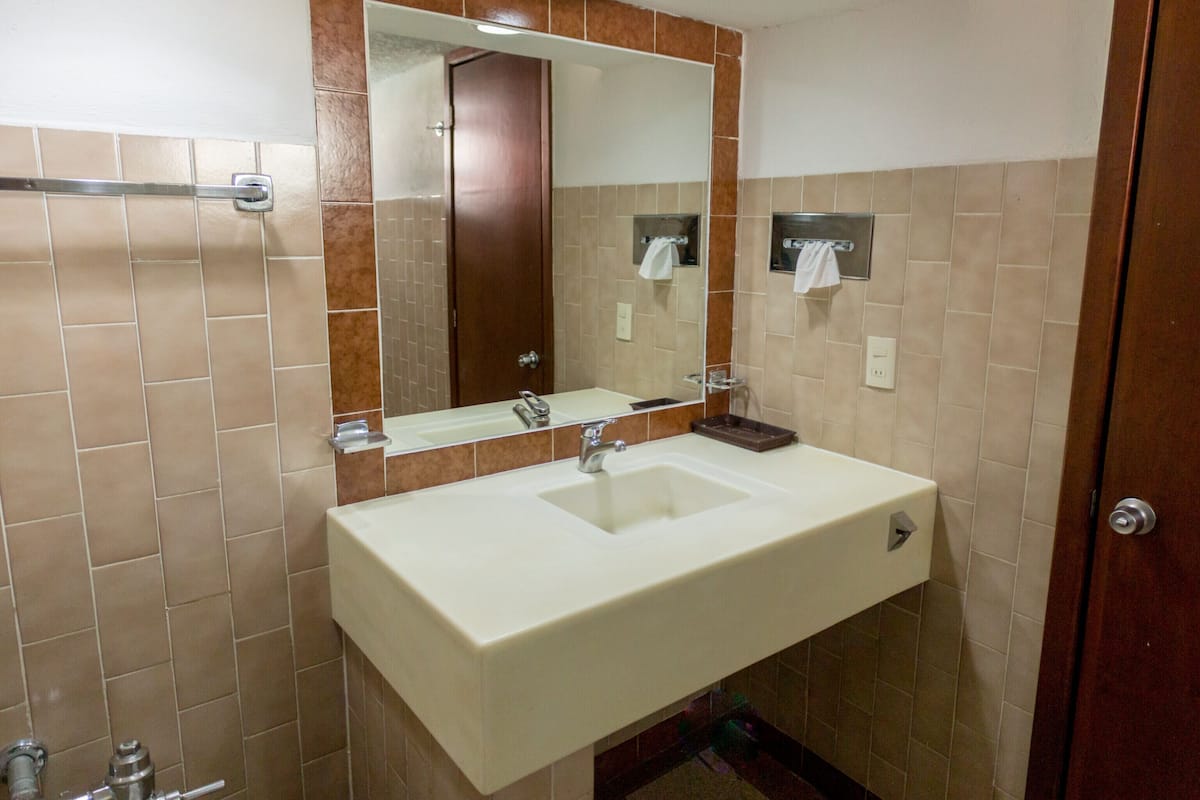 comfort suite | bathroom | shower, free toiletries, hair dryer, towels