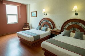 Standard Room, 2 Double Beds | Minibar, desk, free WiFi, bed sheets - Hotel Quinta Antigua (Lazaro Cardenas)