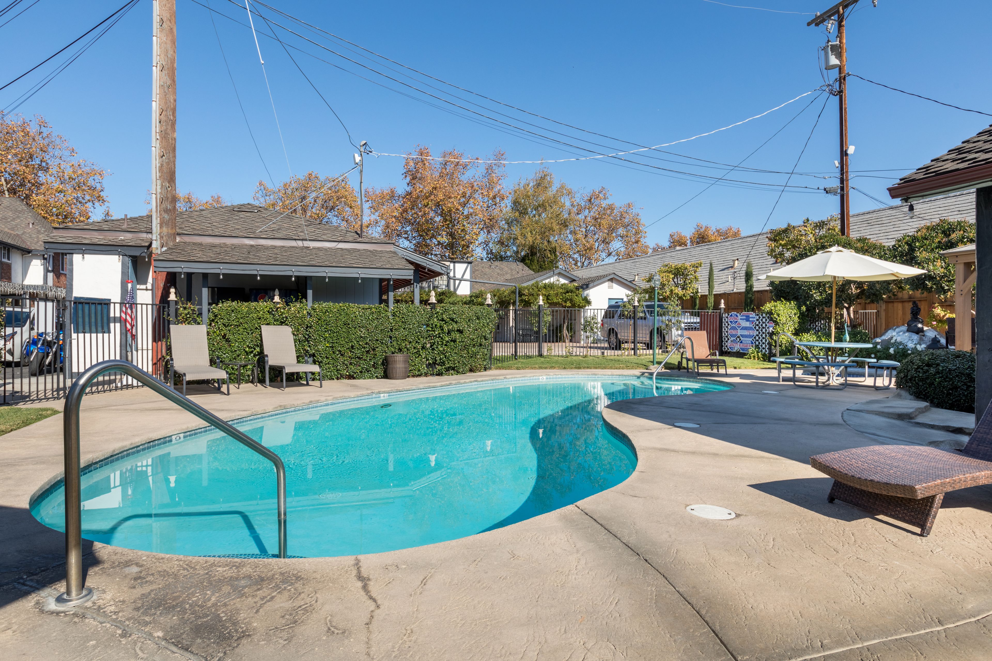 Outdoor pool, open 8 AM to 9:00 PM, pool umbrellas, sun loungers