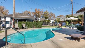 Outdoor pool, open 8 AM to 9:00 PM, pool umbrellas, sun loungers