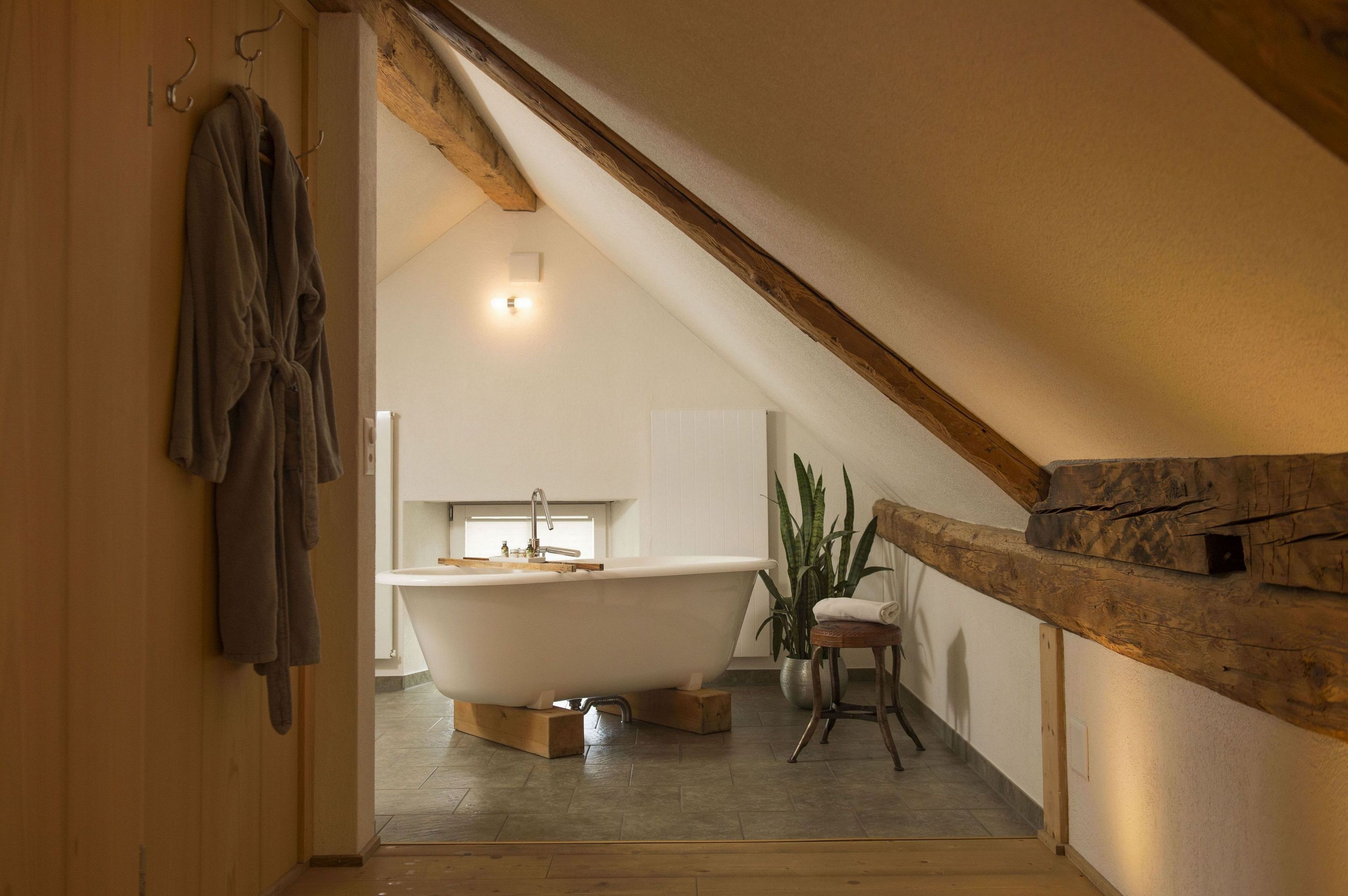 deluxe double room | bathroom | deep-soaking bathtub, hair dryer, dressing gowns, towels
