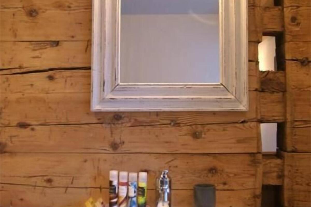 deep-soaking bathtub, hair dryer, dressing gowns, towels