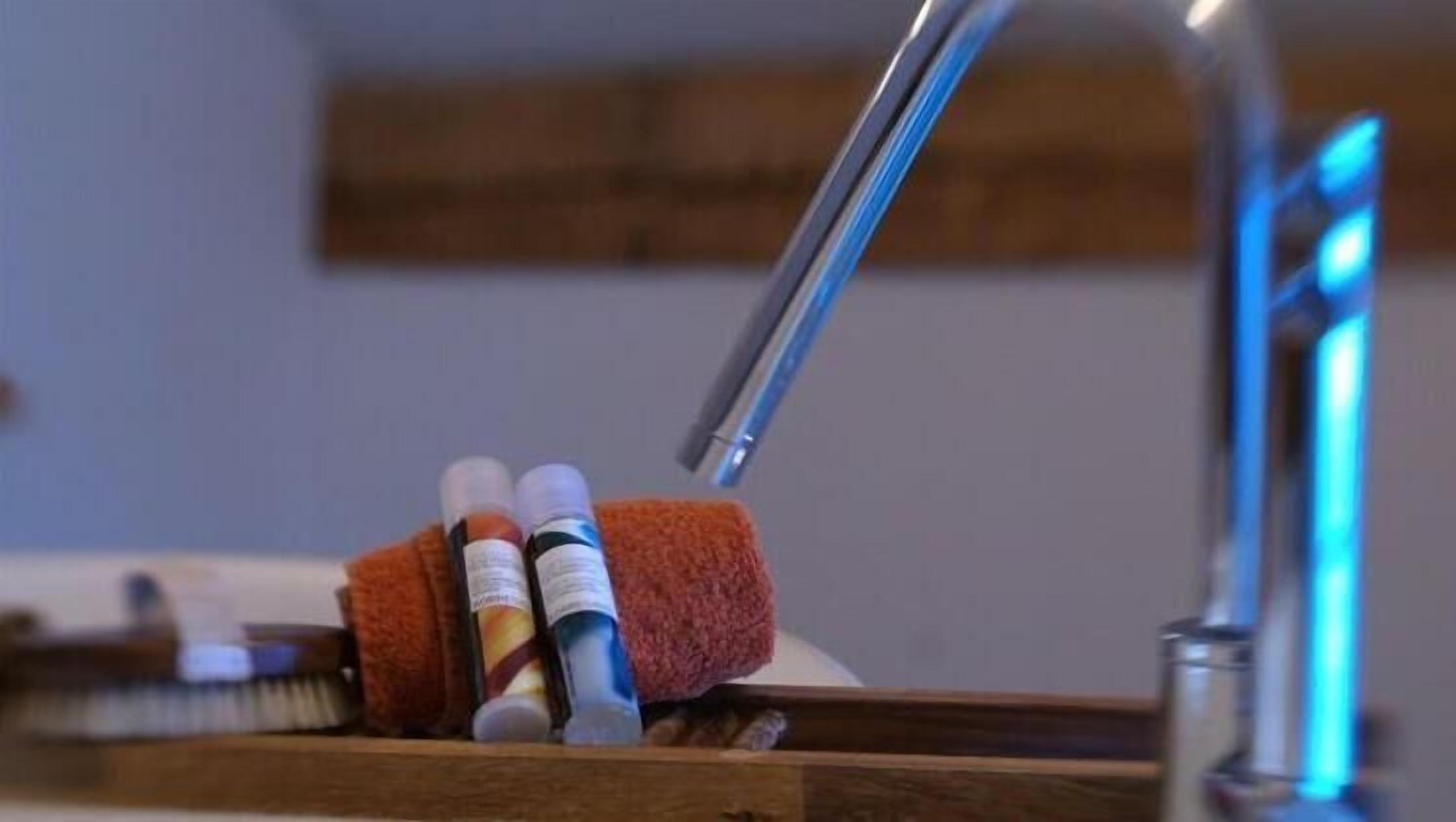 deep-soaking bathtub, hair dryer, dressing gowns, towels