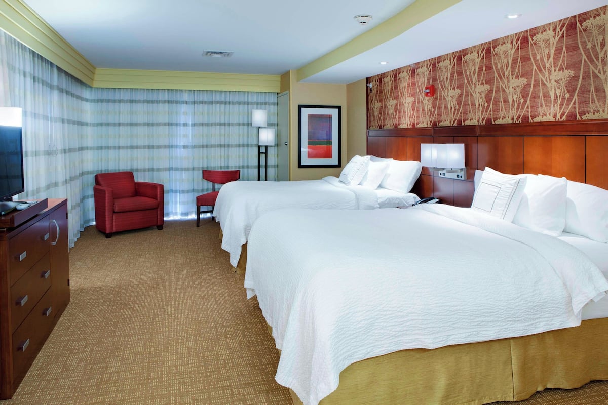 Premium bedding, memory-foam beds, in-room safe, desk