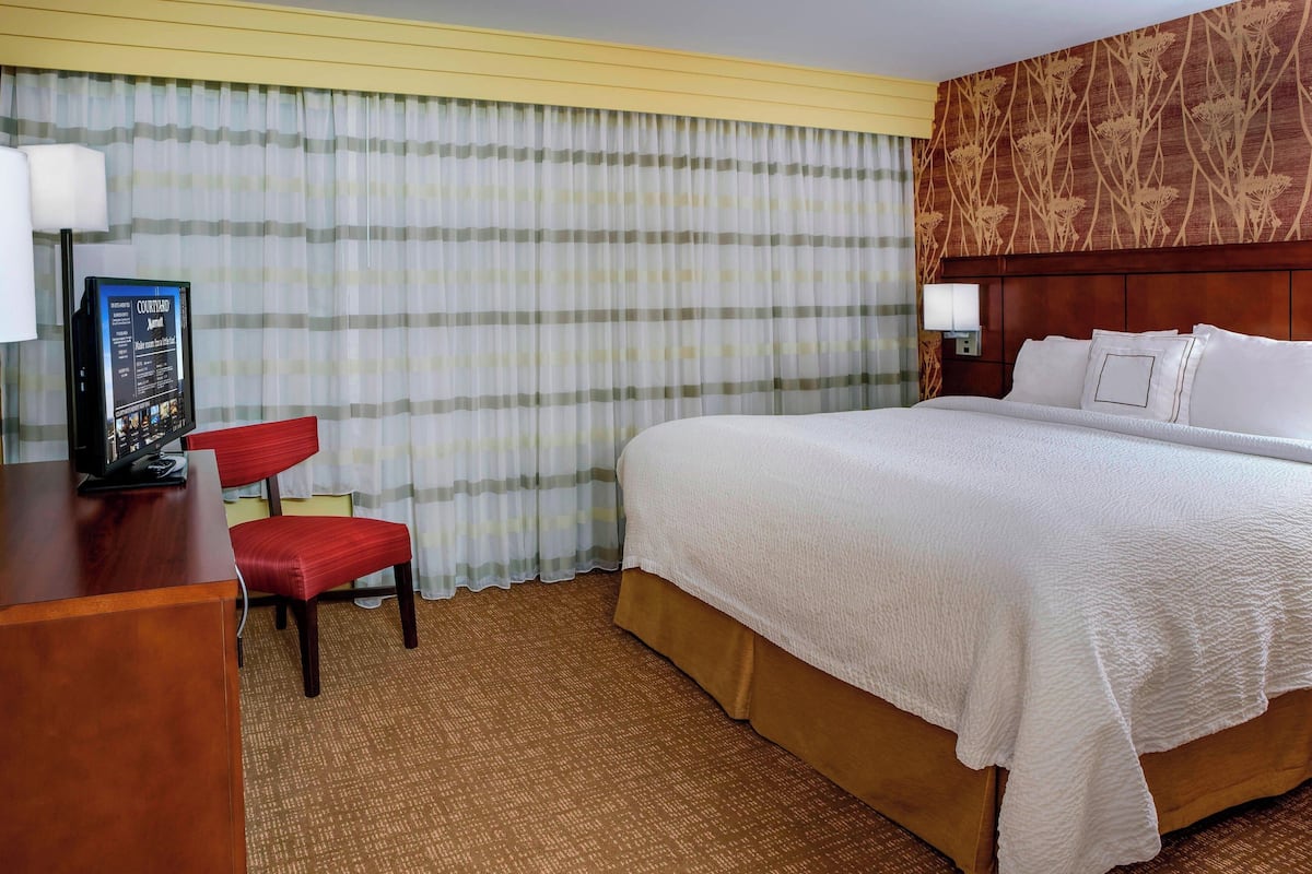 Premium bedding, memory-foam beds, in-room safe, desk