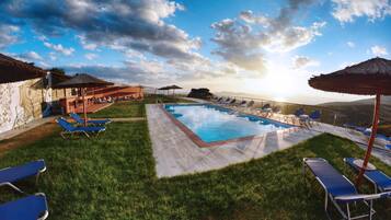 Outdoor pool, pool umbrellas, pool loungers