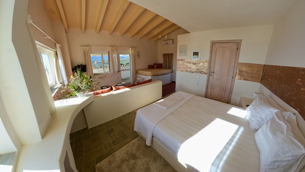 Junior Suite, Sea View | Premium bedding, minibar, in-room safe, free cots/infant beds - Filion Eco Hotel (Karystos)