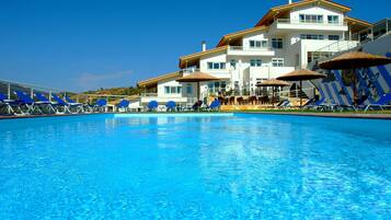 Outdoor pool, pool umbrellas, pool loungers