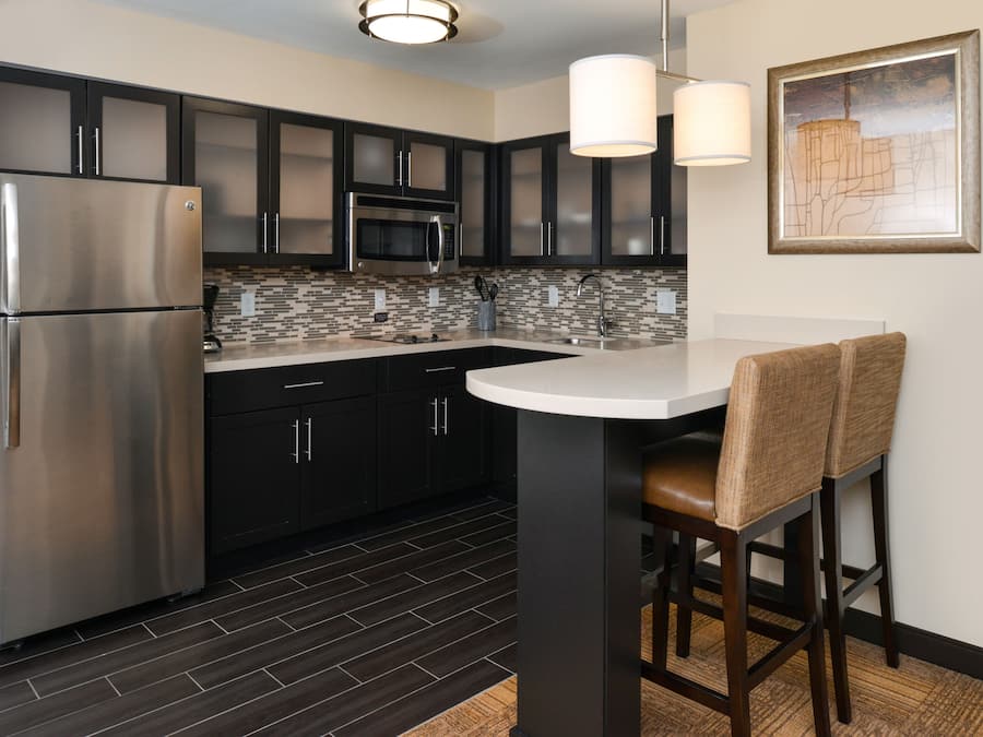 Full-sized fridge, microwave, stovetop, dishwasher