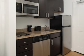 Studio, 1 King Bed with Sofa bed | Private kitchen | Fridge, microwave, stovetop, dishwasher