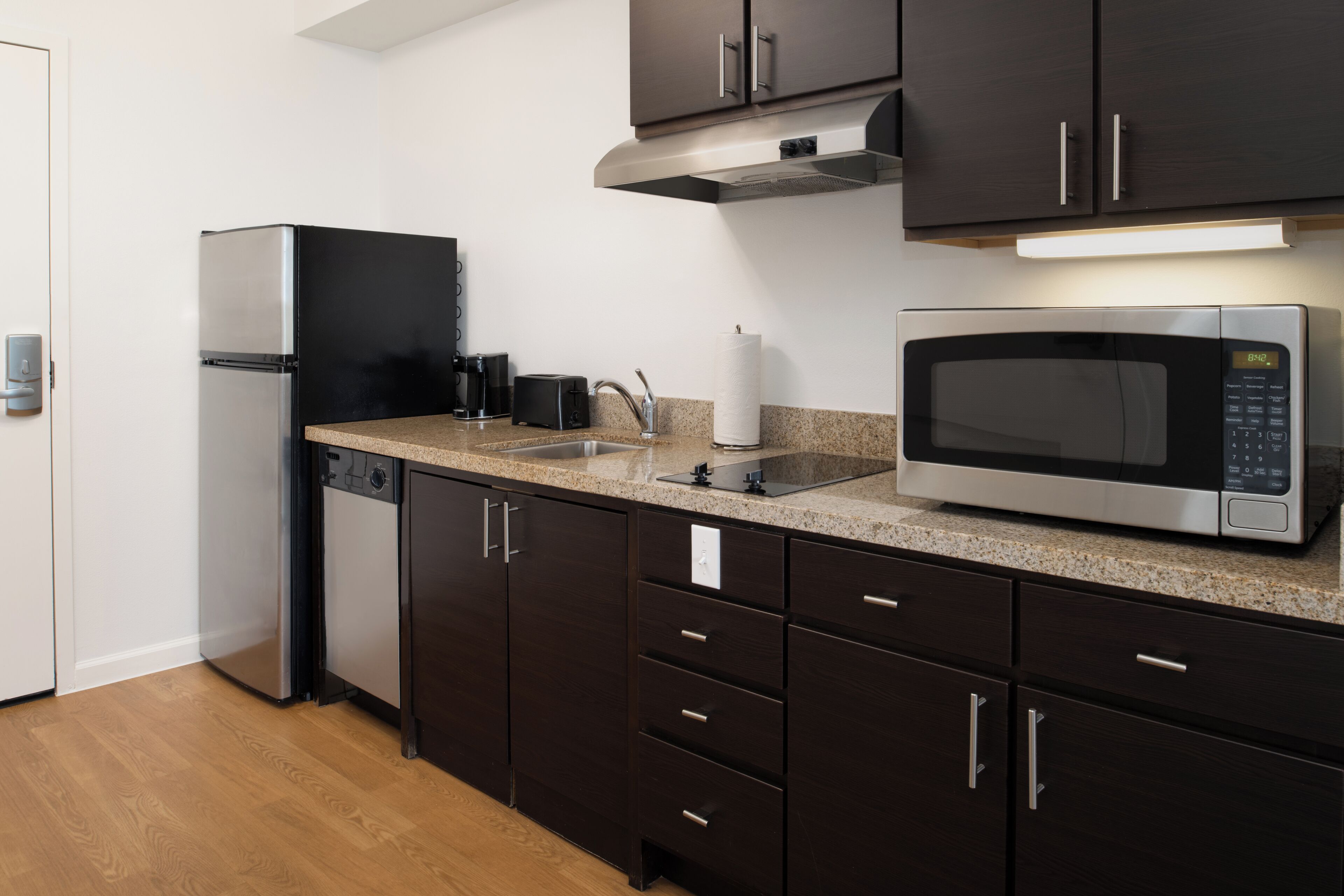 studio, multiple beds | private kitchen | fridge, microwave, stovetop, dishwasher
