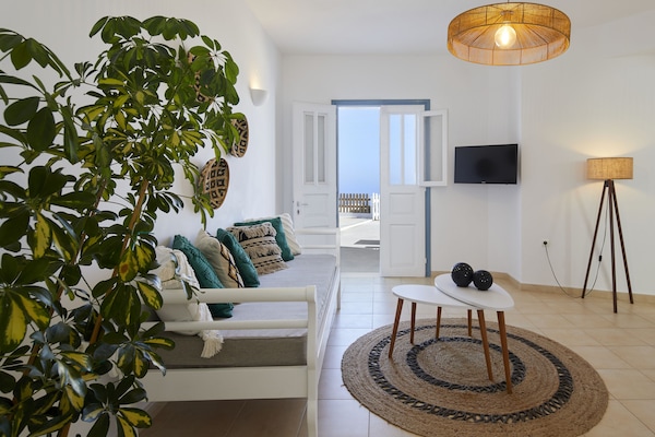 Family Suite with Outdoor Hot Tub | Living area | LCD TV