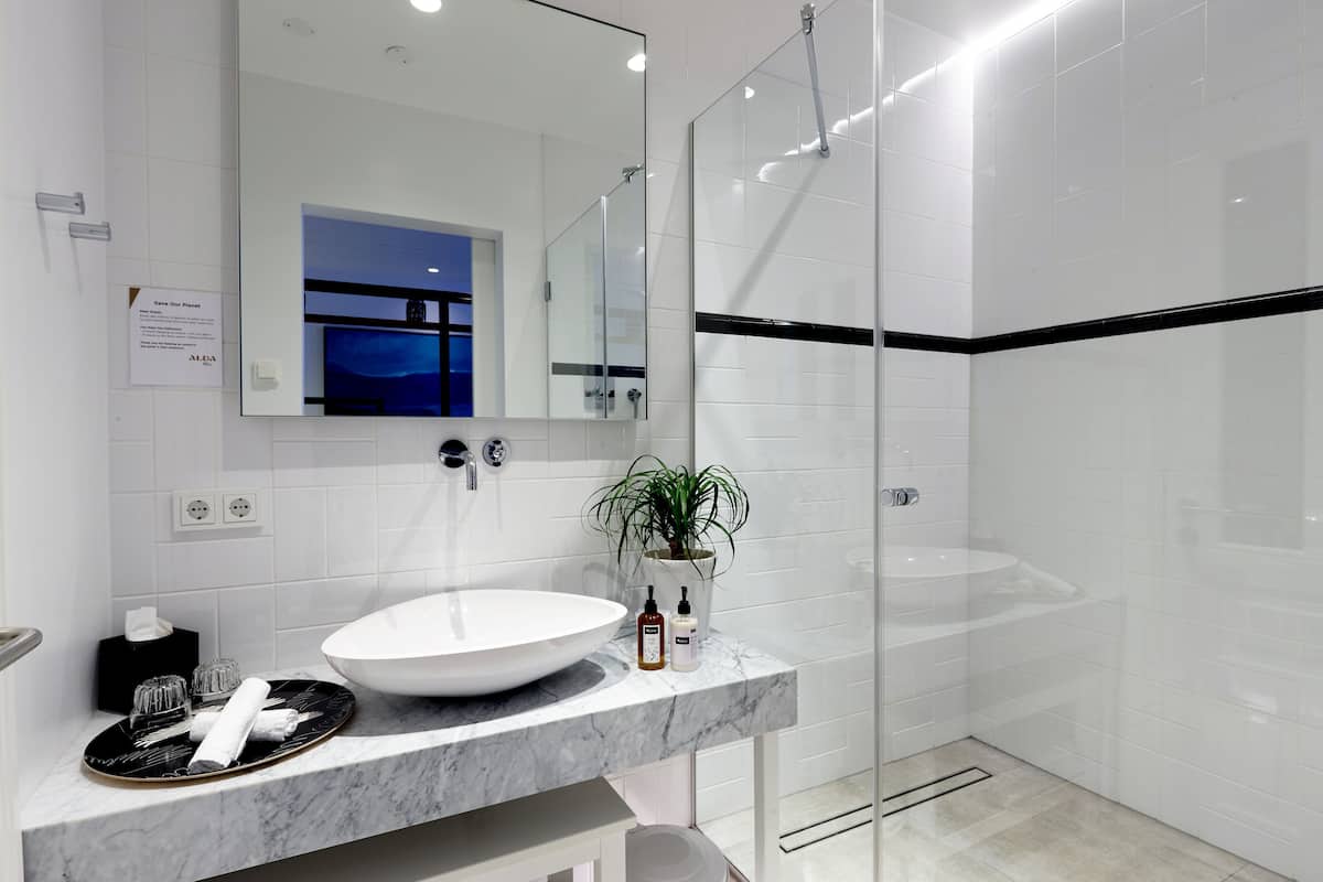 shower, designer toiletries, hair dryer, bathrobes