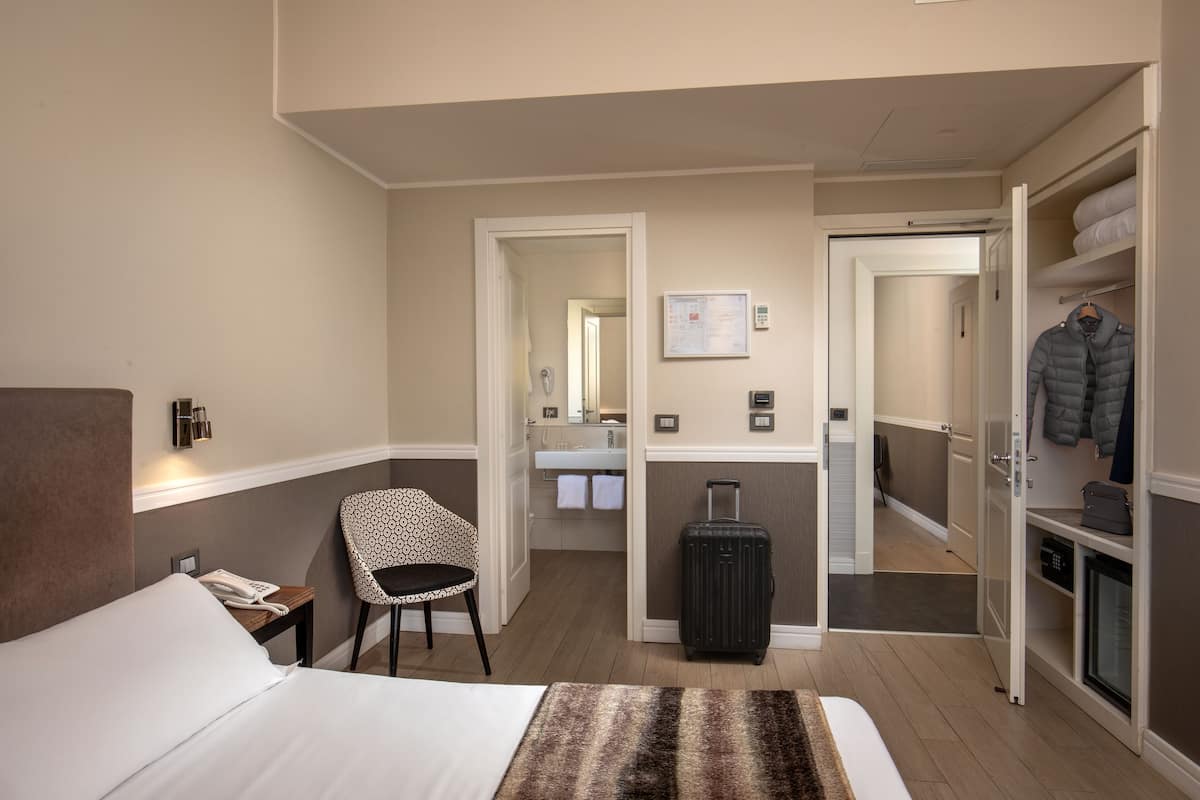 Family Room, Connecting Rooms | 1 bedroom, minibar, in-room safe, desk