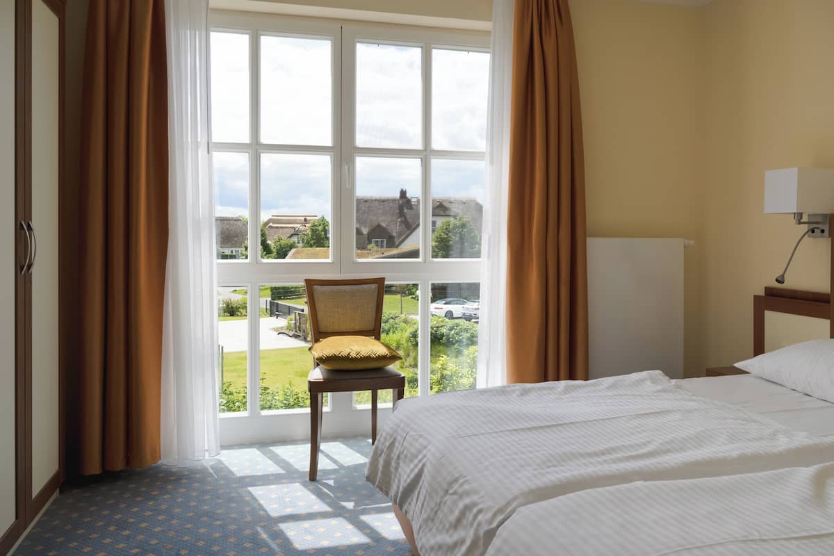 family apartment, kitchen | 1 bedroom, hypo-allergenic bedding, in-room safe, iron/ironing board