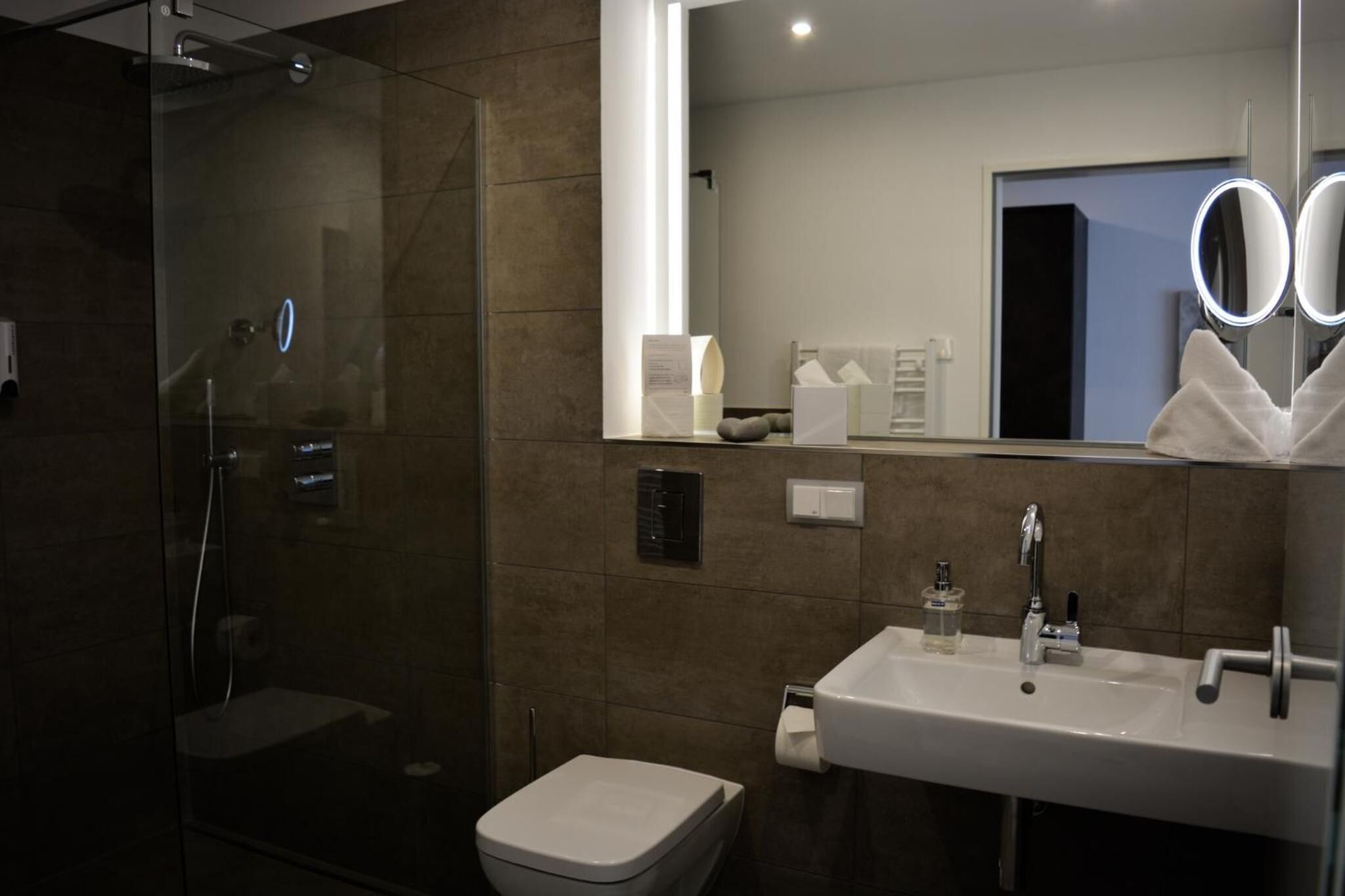 shower, rainfall showerhead, eco-friendly toiletries, hair dryer