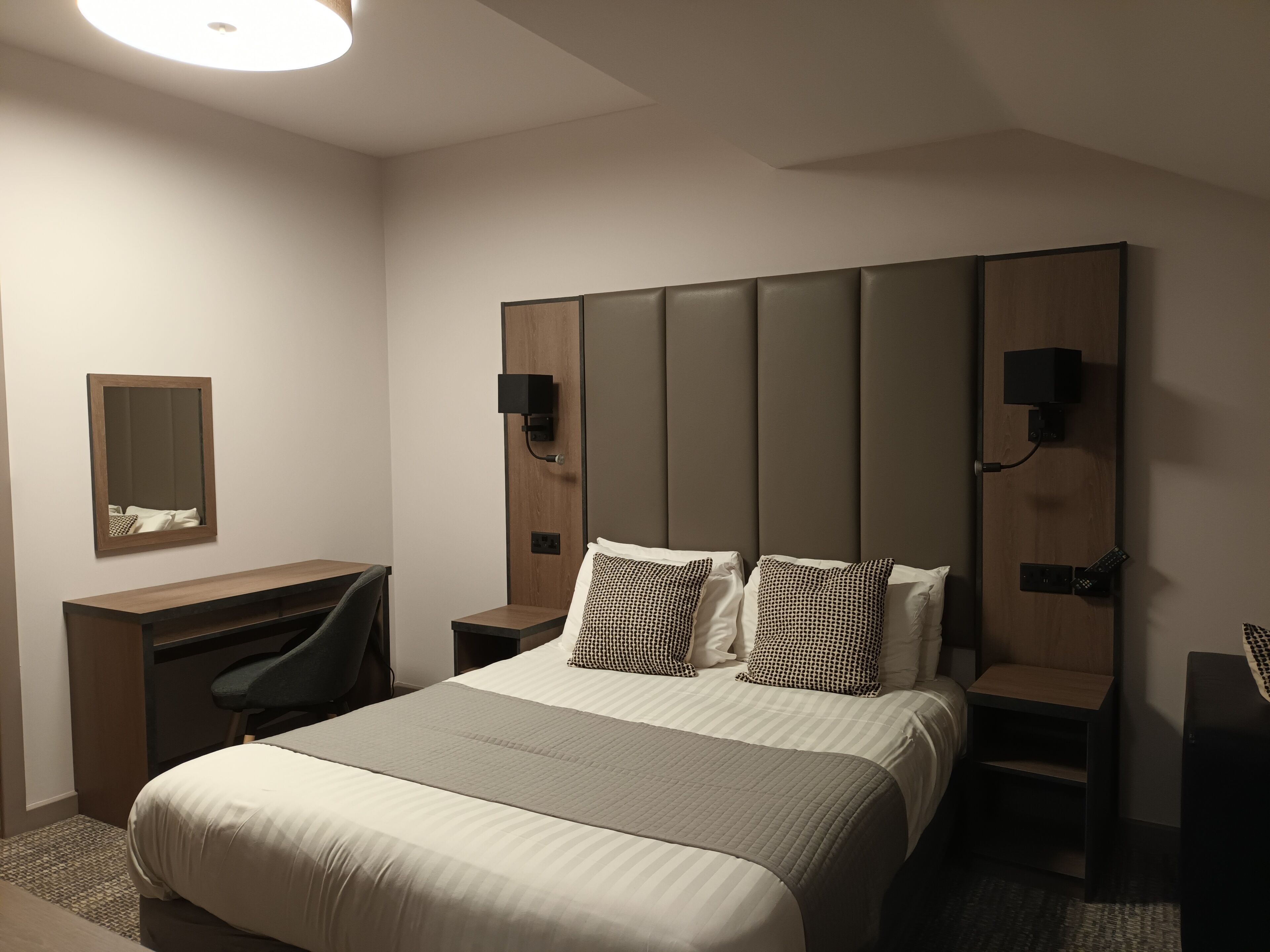 family room | desk, iron/ironing board, rollaway beds, free wifi