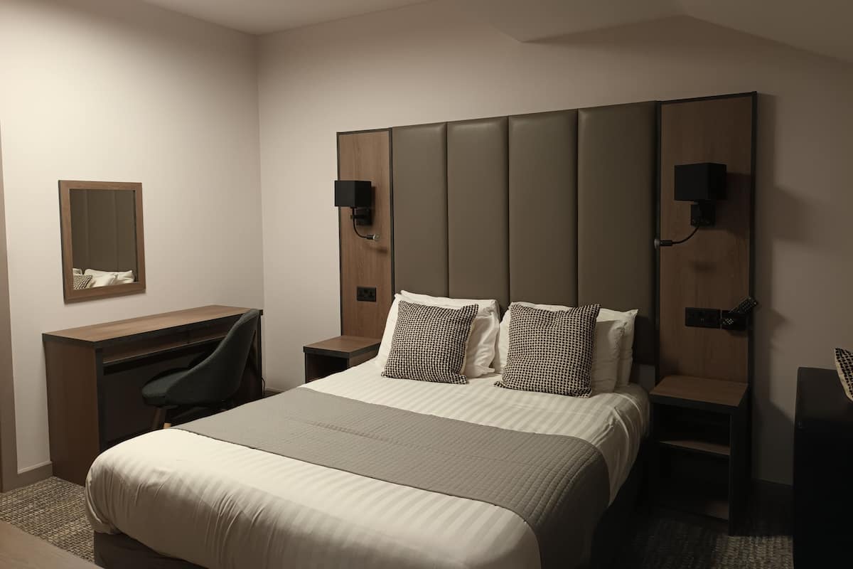 family room | desk, iron/ironing board, rollaway beds, free wifi