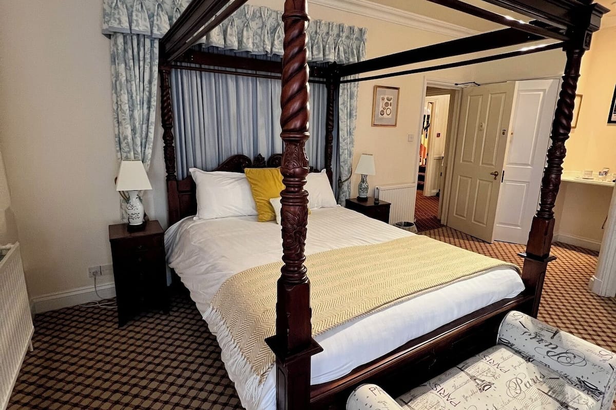 deluxe double room, 1 king bed | desk, laptop workspace, blackout curtains, iron/ironing board