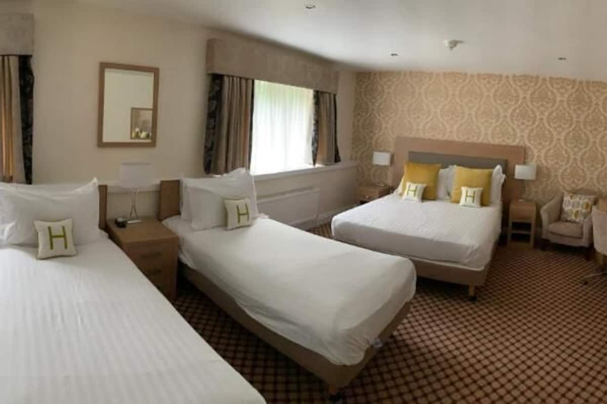 family room | desk, laptop workspace, blackout curtains, iron/ironing board